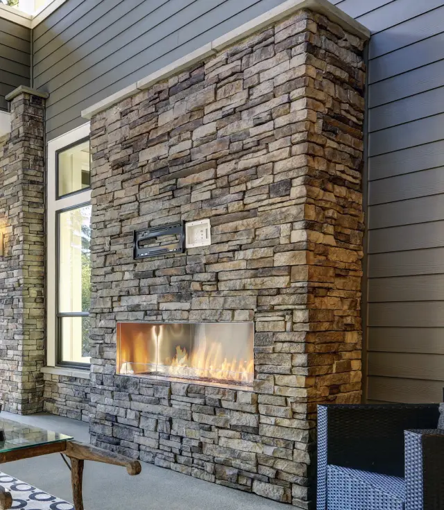 luxury patio stone fireplace