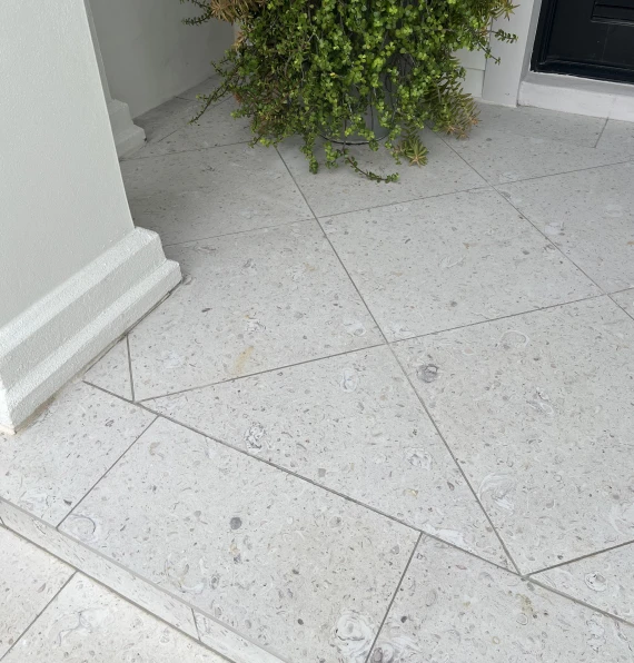 grey stone porch tile diagonal pattern
