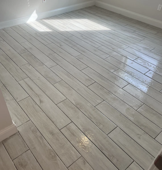 light gray wood plank tile flooring