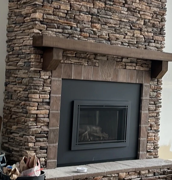 stone fireplace wood mantel