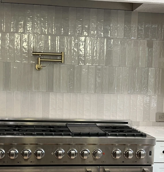 vertical white subway tile backsplash